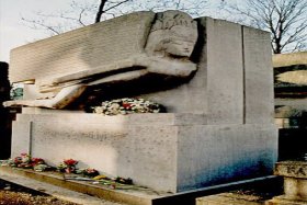 Oscar Wilde's grave, covered in lipstick kisses, at the PÃ¨re Lachaise cemetery
