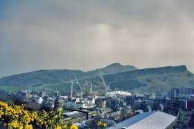 A view of Holyrood Palace and the new Scottish Parliament, watched over by Arthur's Seat, an extinct volcano close to the city centre
