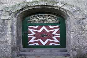 An old doorway with plenty of character in Salzburg