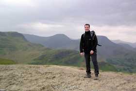 Standing atop of Cat Bells