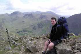 Resting at High Crag with Great Gable, Kirk Fell and the Scafells forming an impressive backdrop