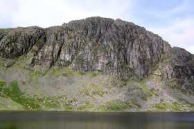 Pavey Ark towers over Stickle Tarn