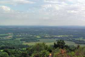 The wide open view of the Sussex weald and the South Downs from Leith Hill