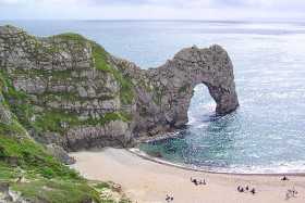 Durdle Door is a natural limestone arch near Lulworth Cove