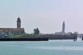 The church towers of Santa Caterina on Mazzorbo and precarious San Martino on Burano