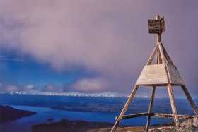 The summit of Mt Luxmore, with Lake Te Anau far below