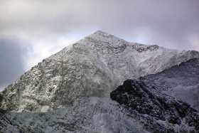 A closeup of a wintery Snowdon