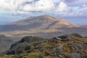Solitary Moel Siabod broods in the sun